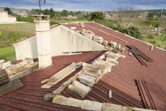 Réfection d'une couverture en double étancheité et tuile anciennes en couvert